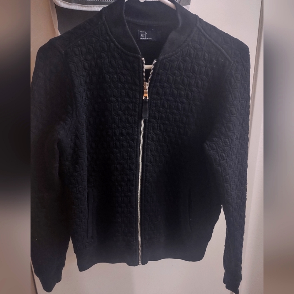 Black jacket with quilted pattern